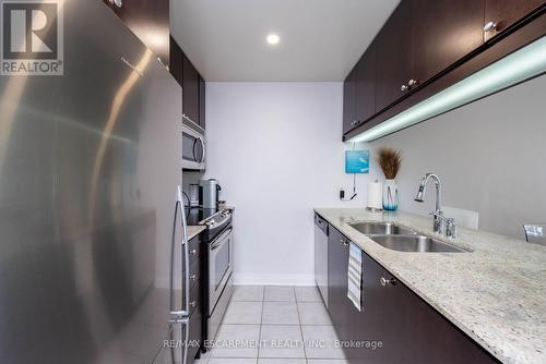 710 - 1055 Southdown Road, Mississauga, ON - Indoor Photo Showing Kitchen With Double Sink