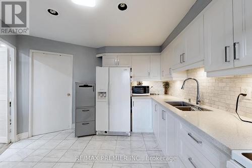 Ph11 - 60 Pavane  Linkway, Toronto, ON - Indoor Photo Showing Kitchen With Double Sink