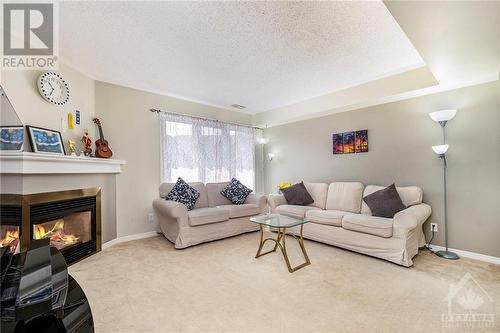 1672 Locksley Lane, Ottawa, ON - Indoor Photo Showing Living Room With Fireplace