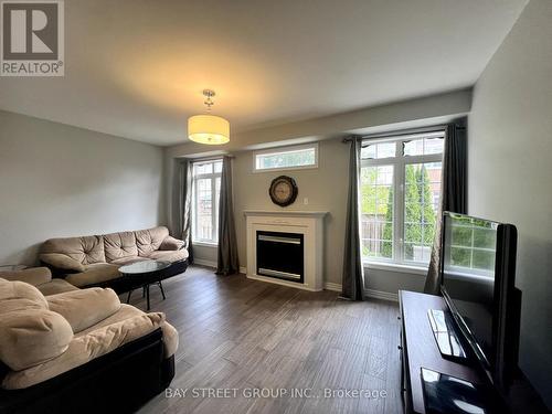 22 Arundel Drive, Vaughan, ON - Indoor Photo Showing Living Room With Fireplace