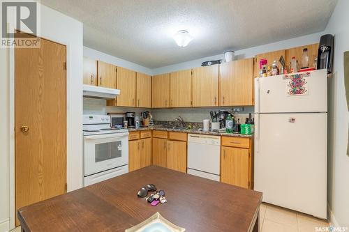 417 2410 Heseltine Road, Regina, SK - Indoor Photo Showing Kitchen With Double Sink