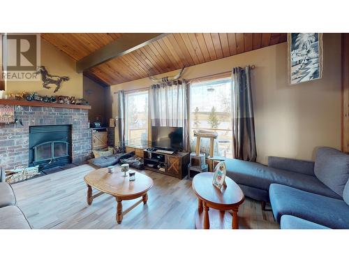 5475 Scuffi Road, 100 Mile House, BC - Indoor Photo Showing Living Room With Fireplace