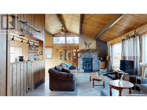 5475 Scuffi Road, 100 Mile House, BC - Indoor Photo Showing Living Room With Fireplace