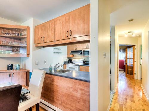 IntÃ©rieur - 101-3232 Rue Des Châteaux, Laval (Chomedey), QC - Indoor Photo Showing Kitchen With Double Sink