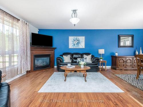 60 Mill St, Southgate, ON - Indoor Photo Showing Living Room With Fireplace