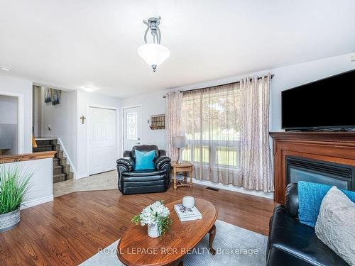 60 Mill St, Southgate, ON - Indoor Photo Showing Living Room With Fireplace