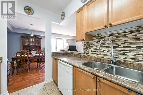 403 - 2088 Lawrence Avenue, Toronto, ON - Indoor Photo Showing Kitchen With Double Sink