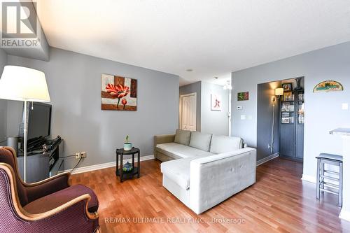 403 - 2088 Lawrence Avenue, Toronto, ON - Indoor Photo Showing Living Room