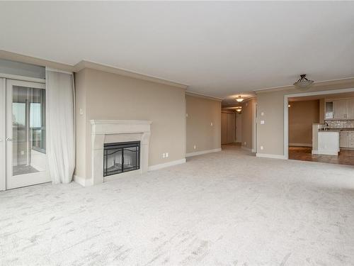 405-1033 Belmont Ave, Victoria, BC - Indoor Photo Showing Living Room With Fireplace