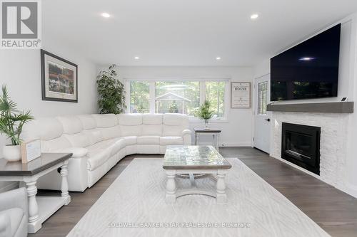 15 Ridge Boulevard, Tillsonburg, ON - Indoor Photo Showing Living Room With Fireplace