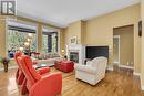 1077 Peak Point Drive, West Kelowna, BC  - Indoor Photo Showing Living Room With Fireplace 