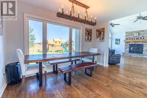 321311 Concession 6-7 Road, East Luther Grand Valley, ON - Indoor Photo Showing Dining Room With Fireplace