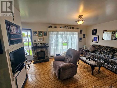 775 Coffyn Crescent, Bathurst, NB - Indoor Photo Showing Living Room With Fireplace