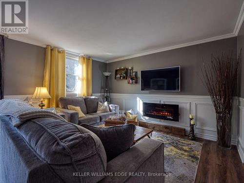 1 - 594 Durham Crescent, Woodstock, ON - Indoor Photo Showing Living Room With Fireplace