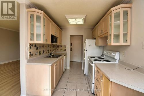 401 - 2411 New Street, Burlington, ON - Indoor Photo Showing Kitchen With Double Sink