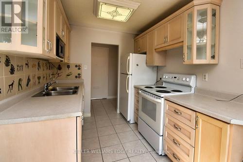 401 - 2411 New Street, Burlington, ON - Indoor Photo Showing Kitchen With Double Sink