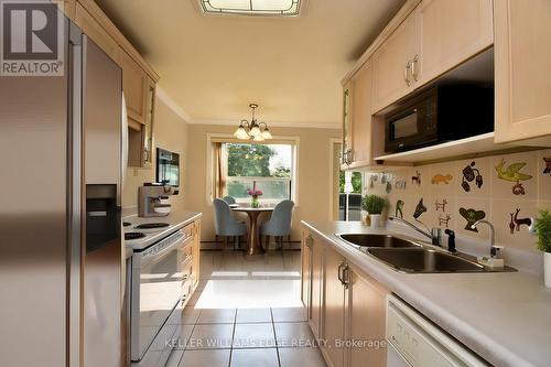 401 - 2411 New Street, Burlington, ON - Indoor Photo Showing Kitchen With Double Sink