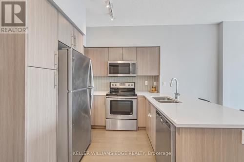 1106 - 55 Speers Road, Oakville, ON - Indoor Photo Showing Kitchen With Double Sink