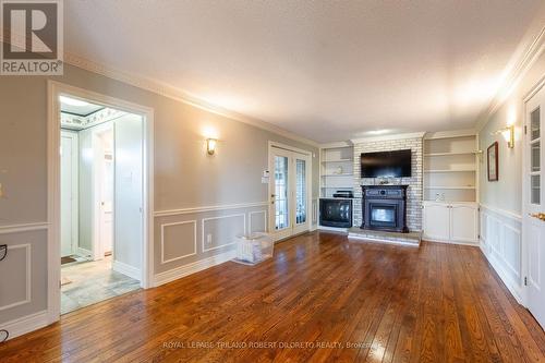 3480 Cuddy Drive, Adelaide Metcalfe, ON - Indoor Photo Showing Living Room With Fireplace