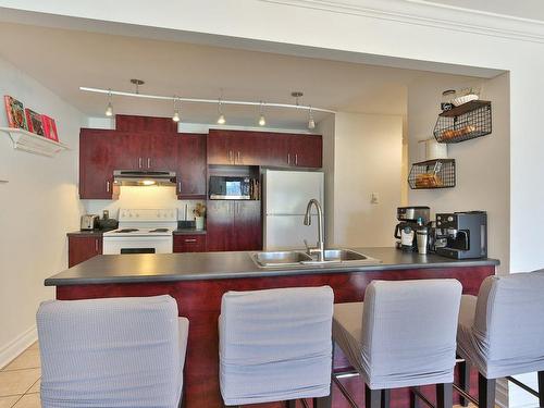 Cuisine - 1-4245 Boul. Rosemont, Montréal (Rosemont/La Petite-Patrie), QC - Indoor Photo Showing Kitchen With Double Sink