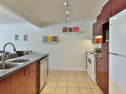 Cuisine - 1-4245 Boul. Rosemont, Montréal (Rosemont/La Petite-Patrie), QC - Indoor Photo Showing Kitchen With Double Sink