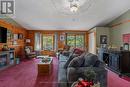 81 Lakeview Road, Bancroft, ON  - Indoor Photo Showing Living Room With Fireplace 