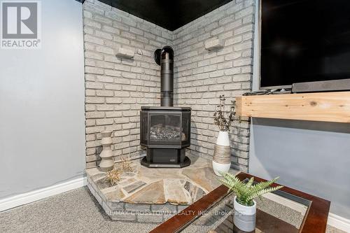 15 Bristow Court, Barrie, ON - Indoor With Fireplace