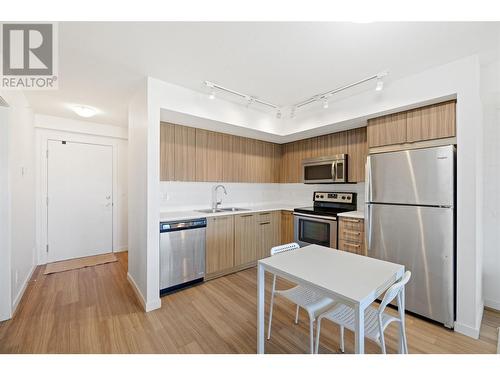 883 Academy Way Unit# Ph3, Kelowna, BC - Indoor Photo Showing Kitchen With Stainless Steel Kitchen With Double Sink