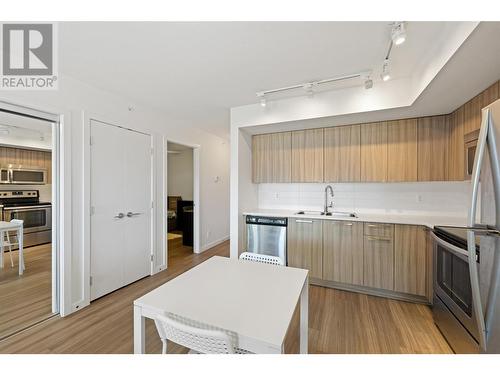 883 Academy Way Unit# Ph3, Kelowna, BC - Indoor Photo Showing Kitchen With Stainless Steel Kitchen With Double Sink