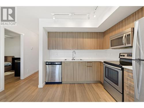 883 Academy Way Unit# Ph3, Kelowna, BC - Indoor Photo Showing Kitchen With Stainless Steel Kitchen With Double Sink