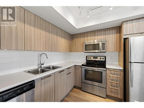 883 Academy Way Unit# Ph3, Kelowna, BC - Indoor Photo Showing Kitchen With Stainless Steel Kitchen With Double Sink With Upgraded Kitchen