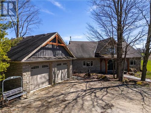 attached 2 car garage with separate entrance to lower level - 740494 10 Sideroad, Chatsworth (Twp), ON - Outdoor