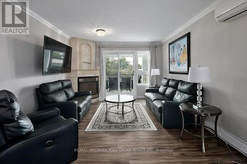 1 - 1 Spruce Street, Wasaga Beach, ON - Indoor Photo Showing Living Room With Fireplace