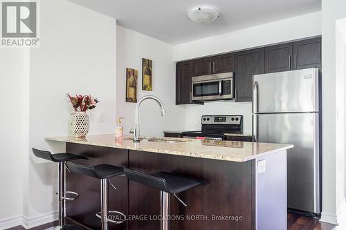 202 - 4 Brandy Lane Drive, Collingwood, ON - Indoor Photo Showing Kitchen With Stainless Steel Kitchen With Upgraded Kitchen