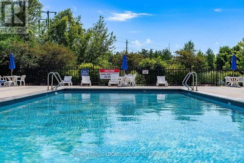 202 - 4 Brandy Lane Drive, Collingwood, ON - Outdoor With In Ground Pool With Backyard