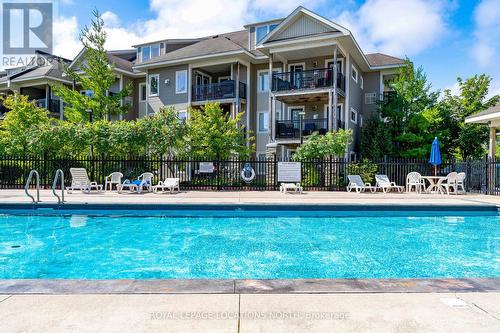 202 - 4 Brandy Lane Drive, Collingwood, ON - Outdoor With In Ground Pool With Balcony