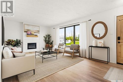 202 Maclean Street, Raymore, SK - Indoor Photo Showing Living Room With Fireplace