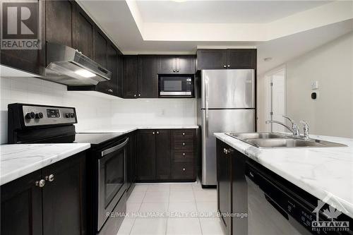 1 - 105 Bluestone, Ottawa, ON - Indoor Photo Showing Kitchen With Stainless Steel Kitchen With Double Sink