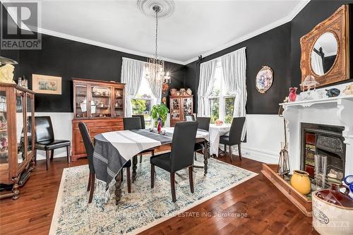 45 William Street, Edwardsburgh/Cardinal, ON - Indoor Photo Showing Dining Room With Fireplace