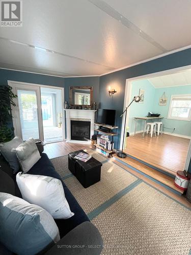 22 - 77307 Bluewater Highway, Bluewater (Bayfield), ON - Indoor Photo Showing Living Room With Fireplace