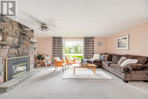 1962 St Johns Road, Innisfil, ON - Indoor Photo Showing Living Room With Fireplace