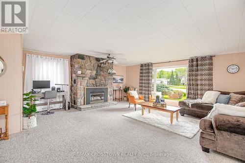 1962 St Johns Road, Innisfil, ON - Indoor Photo Showing Living Room With Fireplace