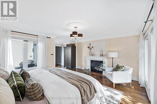 35 Thelma Avenue, Toronto, ON - Indoor Photo Showing Bedroom With Fireplace