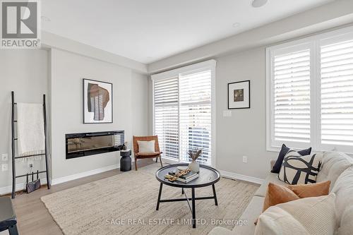 419 Wheat Boom Drive, Oakville, ON - Indoor Photo Showing Living Room With Fireplace