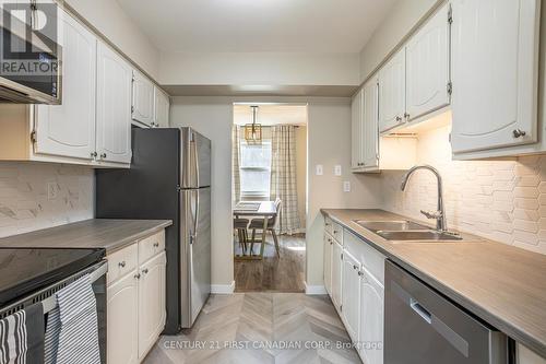 457 Wilkins Street, London, ON - Indoor Photo Showing Kitchen With Double Sink