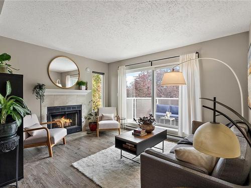 410-2520 Wark St, Victoria, BC - Indoor Photo Showing Living Room With Fireplace