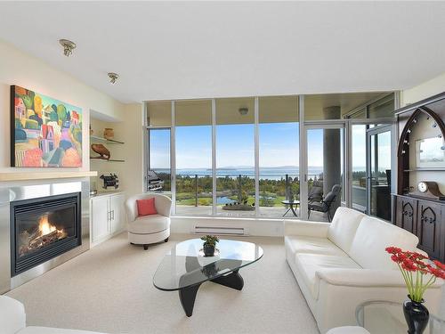 502-748 Sayward Hill Terr, Saanich, BC - Indoor Photo Showing Living Room With Fireplace