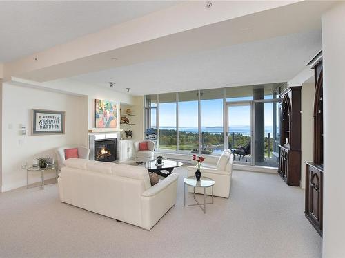 502-748 Sayward Hill Terr, Saanich, BC - Indoor Photo Showing Living Room With Fireplace