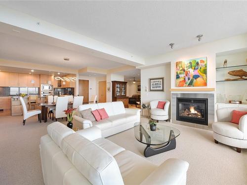 502-748 Sayward Hill Terr, Saanich, BC - Indoor Photo Showing Living Room With Fireplace