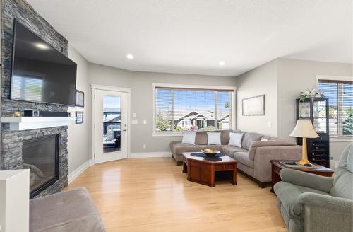 808 Kuipers Crescent, Kelowna, BC - Indoor Photo Showing Living Room With Fireplace